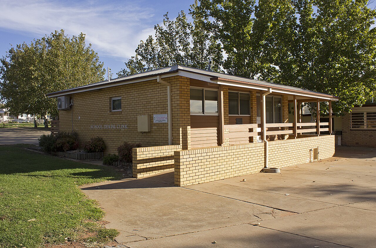 The exterior of a single-storey brick clinic building