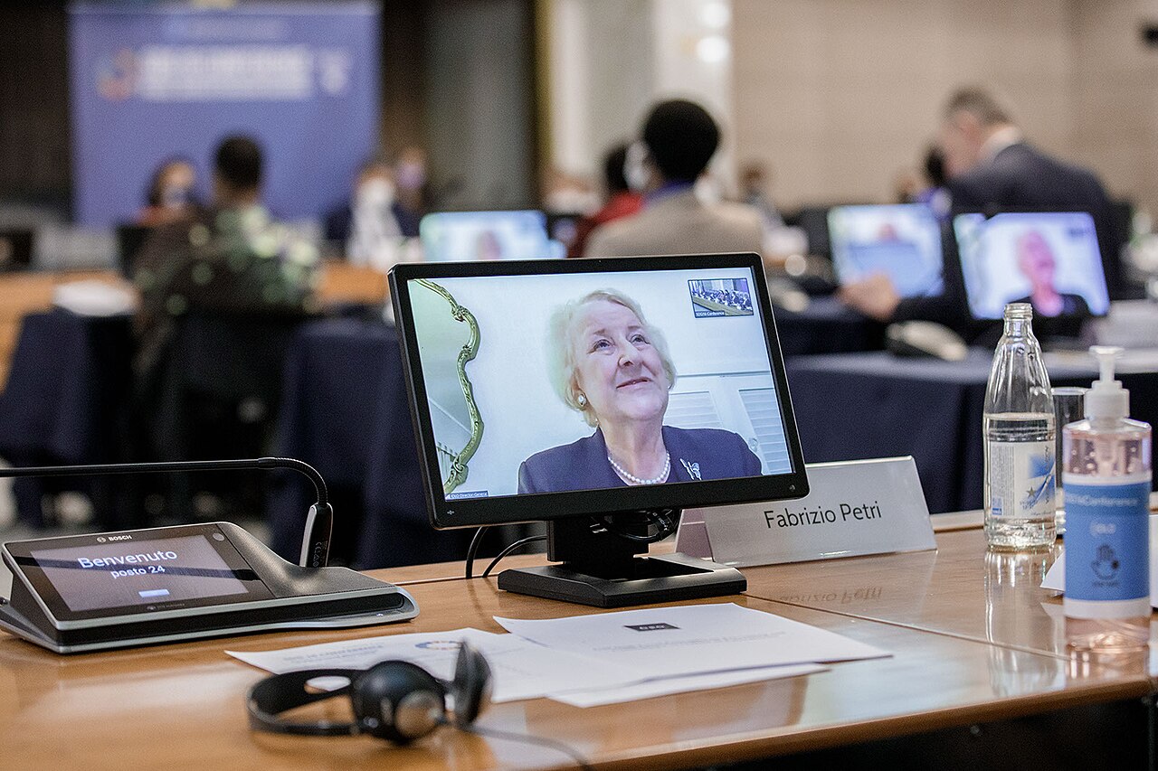 A monitor showing a person during a video conference