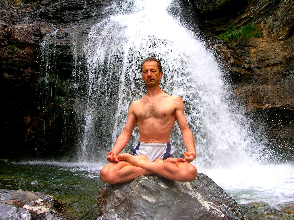 A practitioner sitting in the lotus posture (padmasana) during meditation
